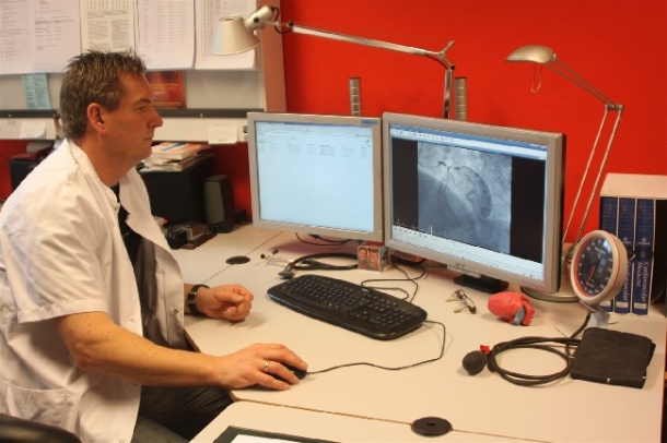 Cardiologist Marcel van der Linde, sending images for consultation from his...