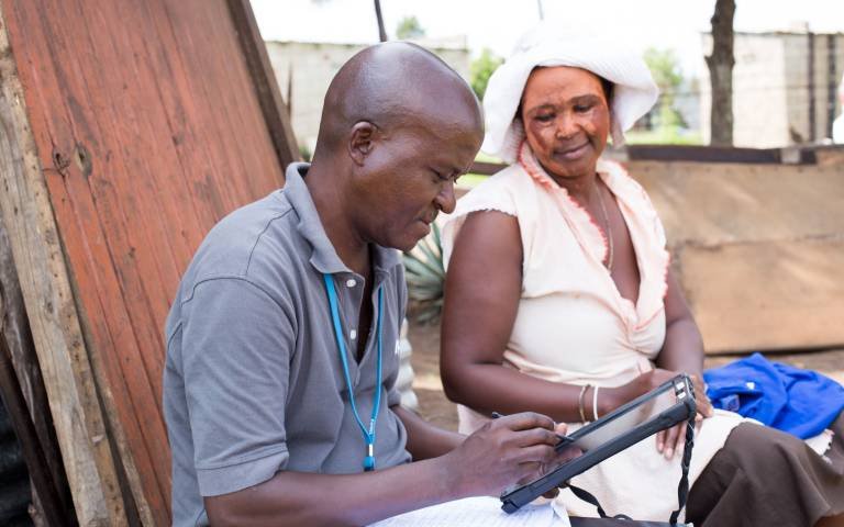 Africa Health Research Institute (AHRI) fieldworkers testing the app with...